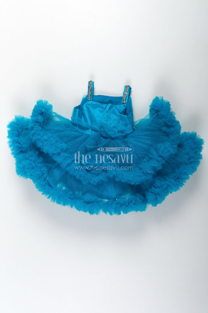 Girls Latest Frock Design in Blue Soft Net with Stone Embellished Belt and Ruffled Skirt