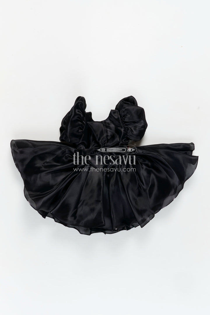Girls Black Satin frock ke design new with Puffy Sleeves and Red Floral Accent for Stylish Comfort