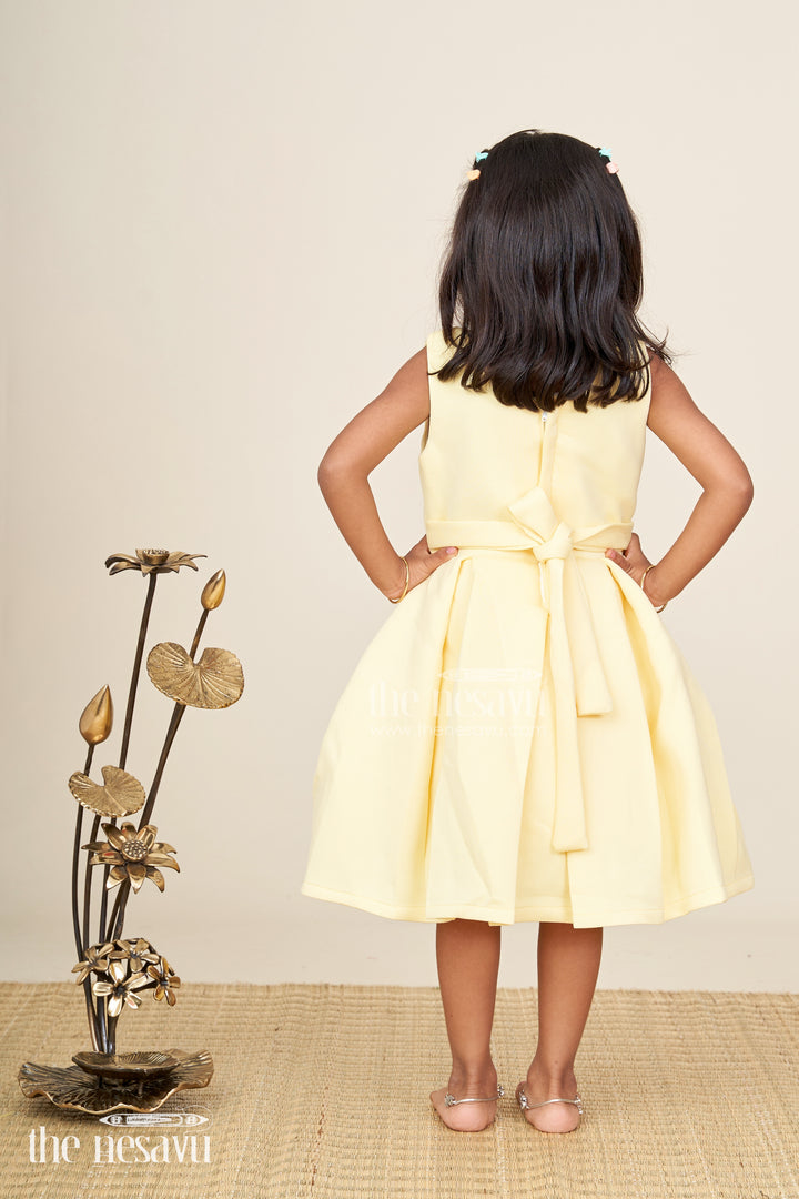 Girls yellow sleeveless party frock with oversized pink flower  birthday special