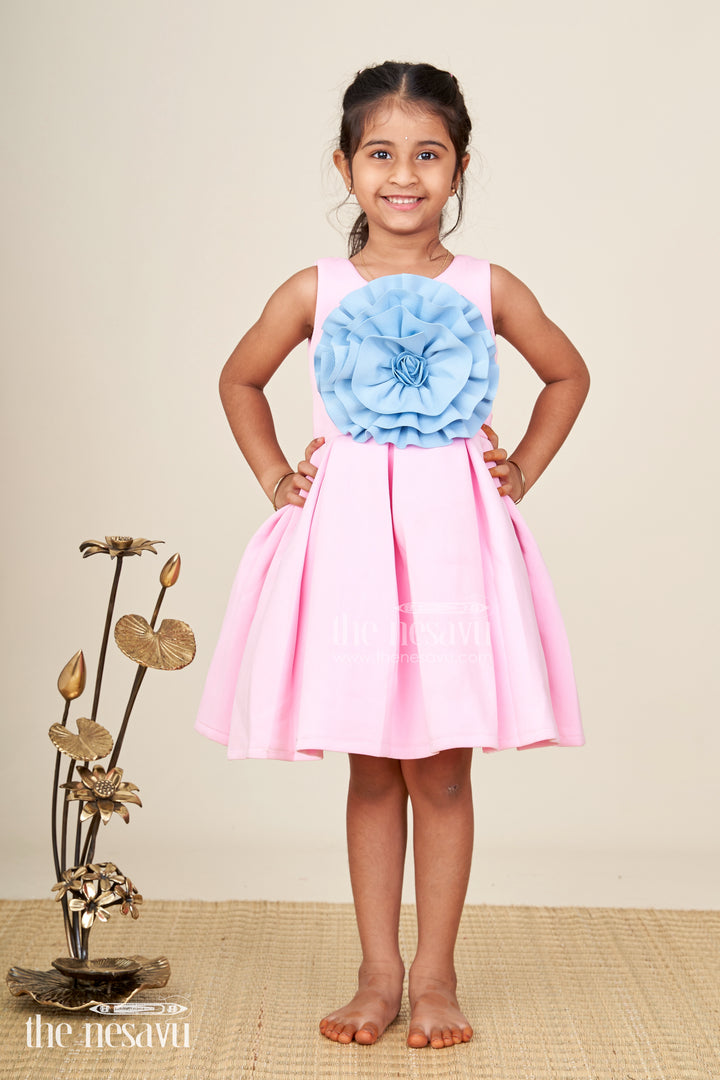 Girls pink scuba party frock with oversized blue flower