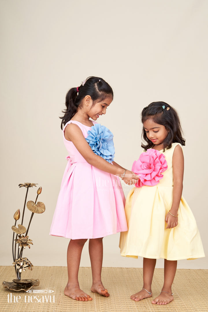 Girls pink scuba party frock with oversized blue flower