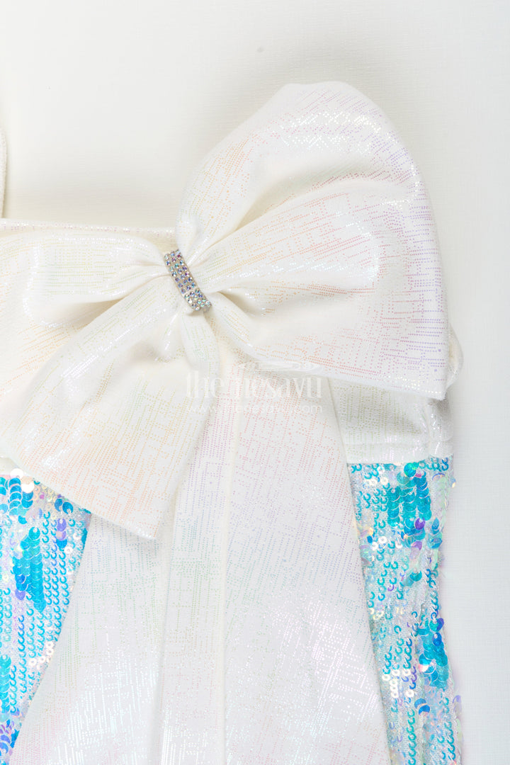 Fancy party frock for baby girl with sequin sparkle and satin bow