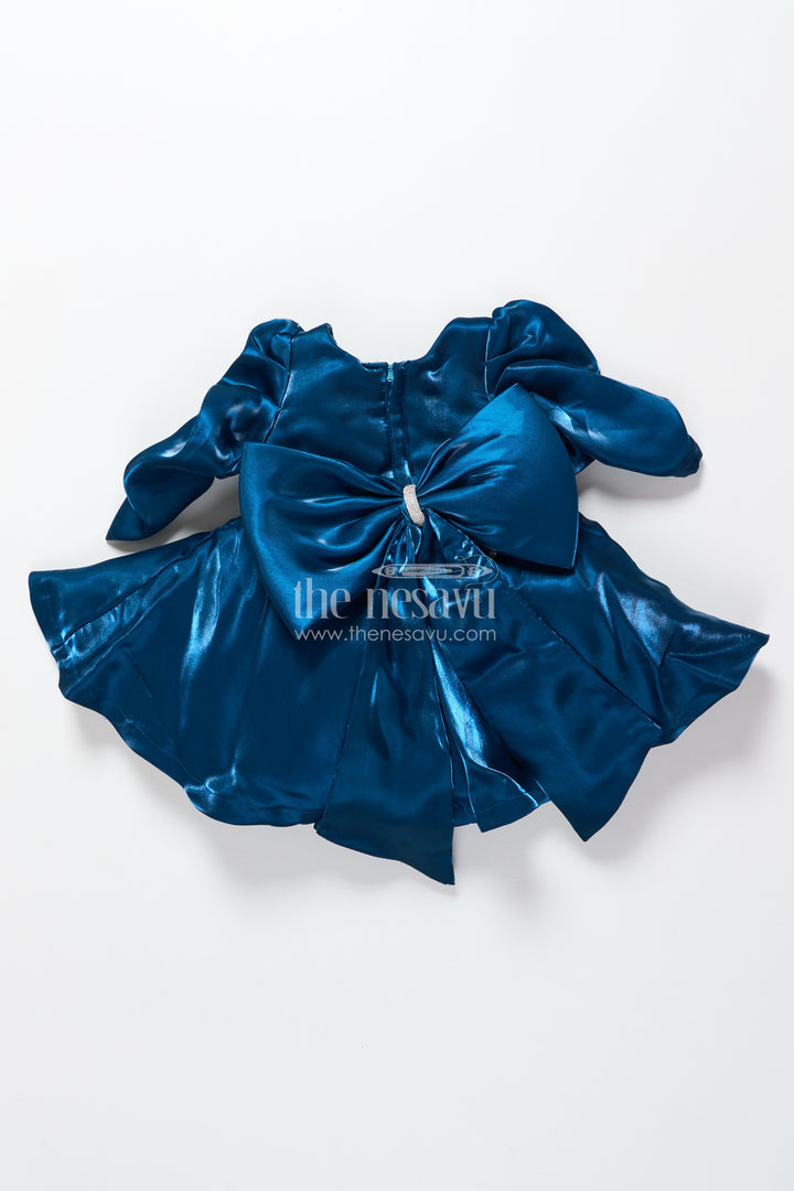 Satin girls party frock with stone embellished belt and matching bow