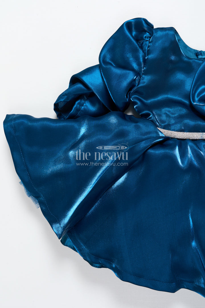 Satin girls party frock with stone embellished belt and matching bow
