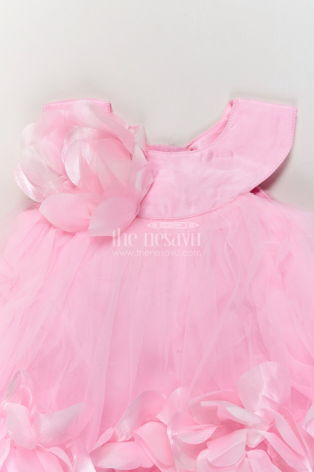 Girls Pink Soft Net Party Frock with Petal Hem and Shoulder Flower