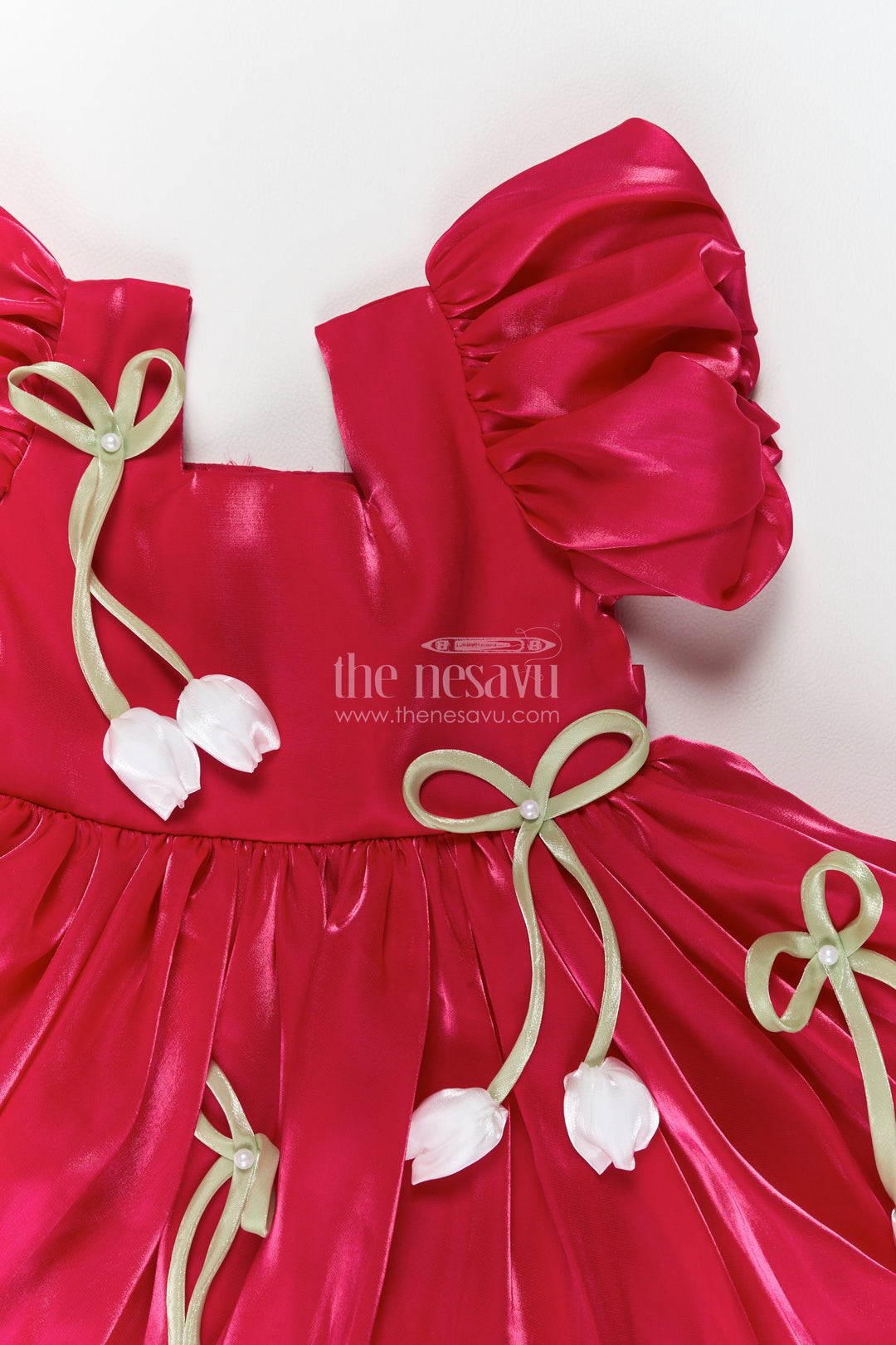 Girls Fuchsia Satin Party Frock with Tulip Bows and Ruffled Sleeves