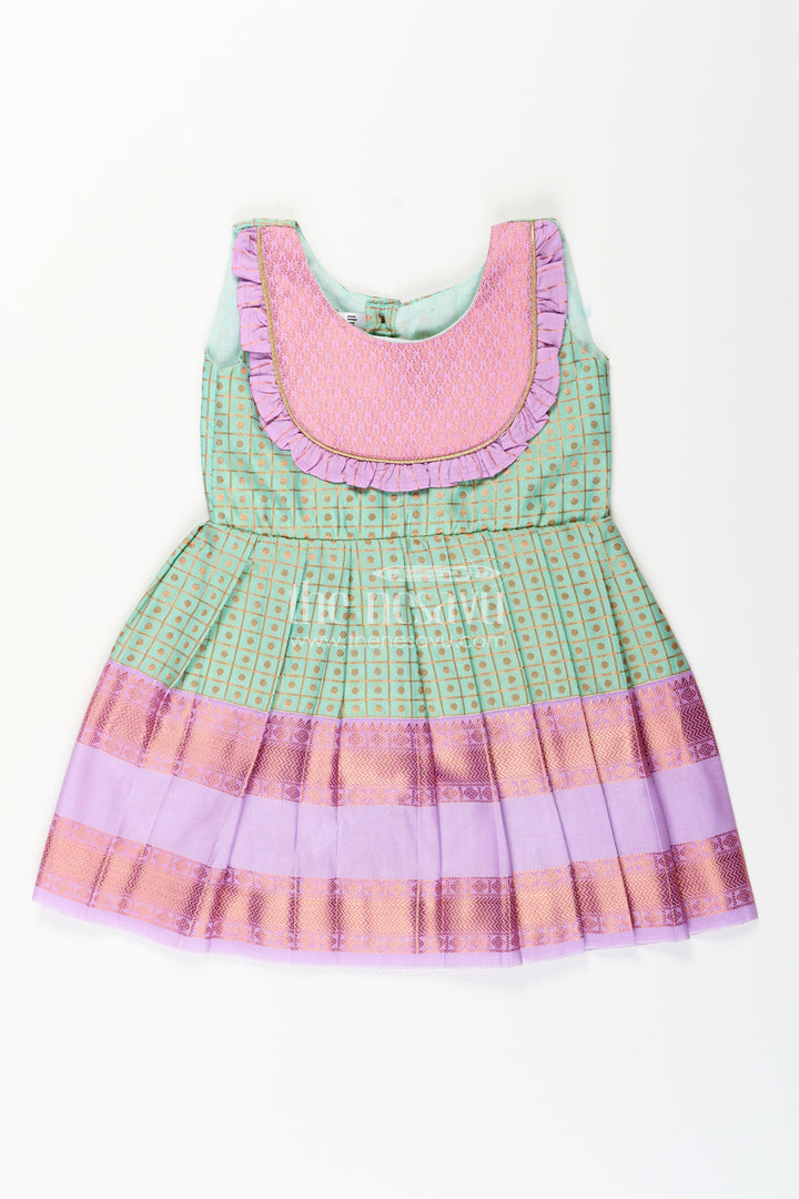 Girls green semi Kanchivaram silk frock with lavender border