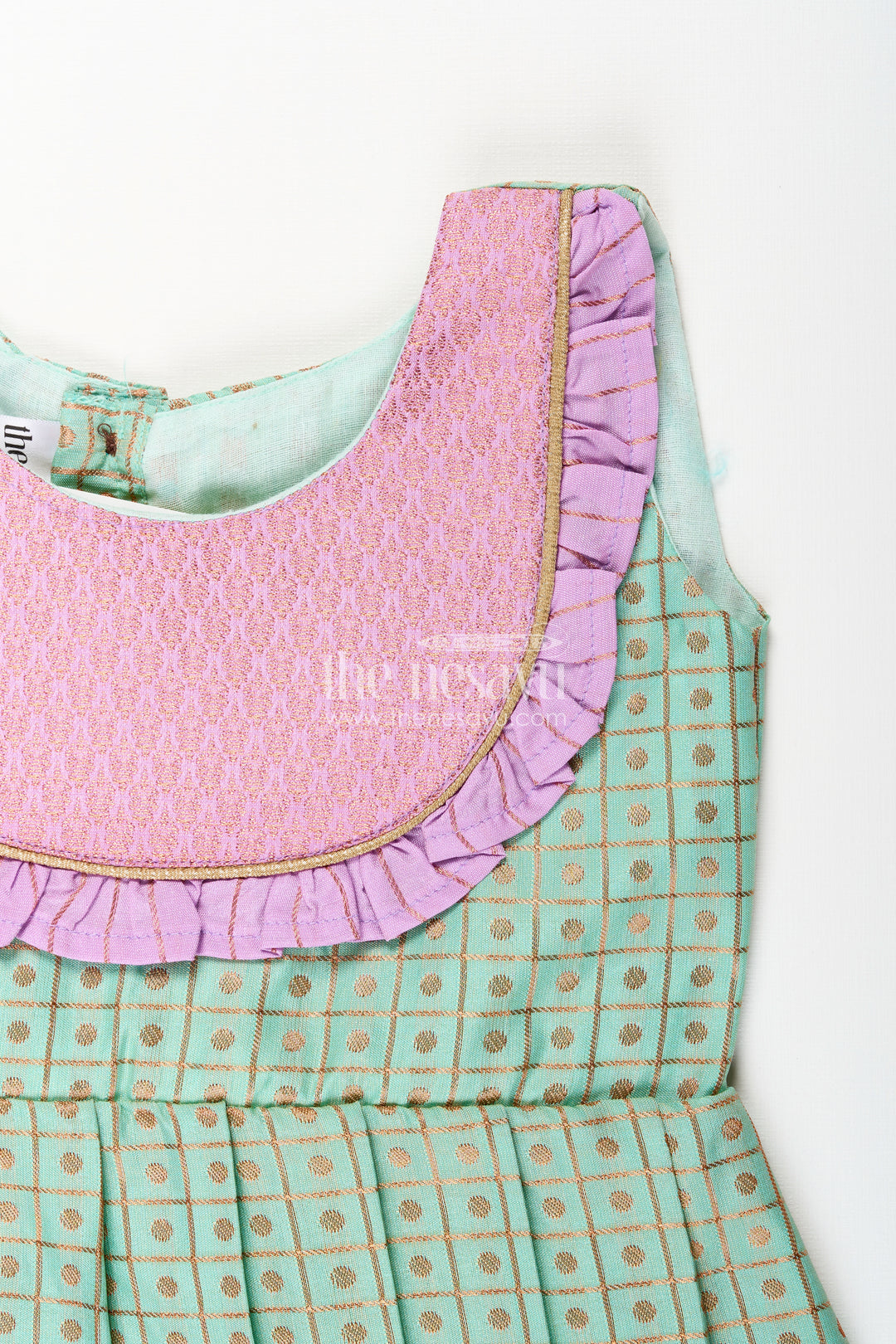 Girls green semi Kanchivaram silk frock with lavender border