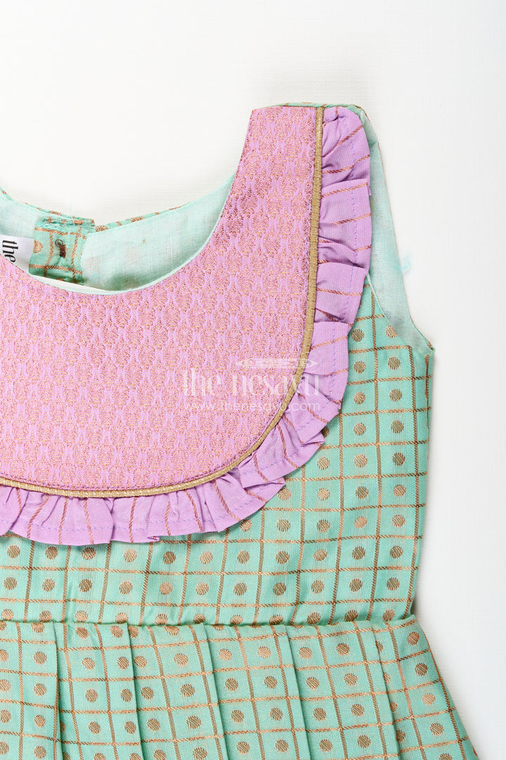 Girls green semi Kanchivaram silk frock with lavender border