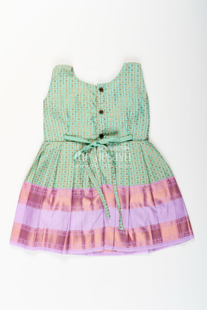 Girls green semi Kanchivaram silk frock with lavender border