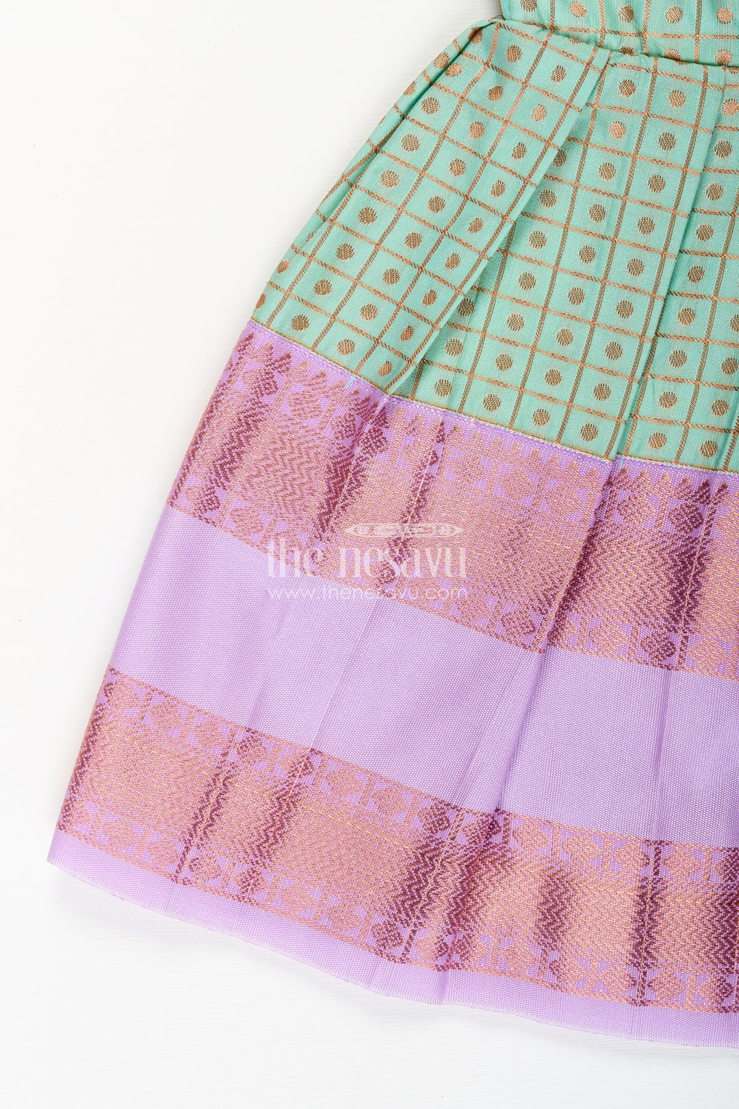Girls green semi Kanchivaram silk frock with lavender border
