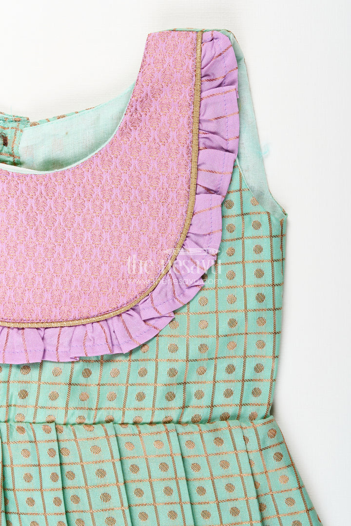 Girls green semi Kanchivaram silk frock with lavender border