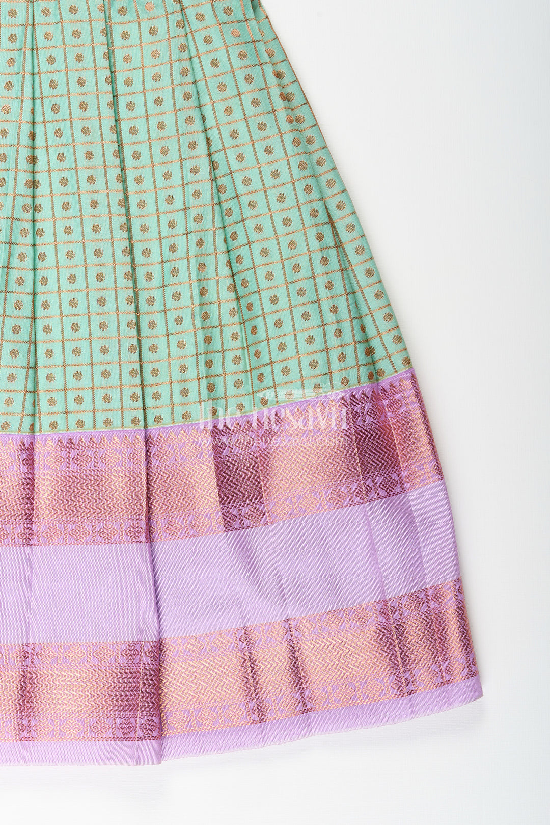 Girls green semi Kanchivaram silk frock with lavender border