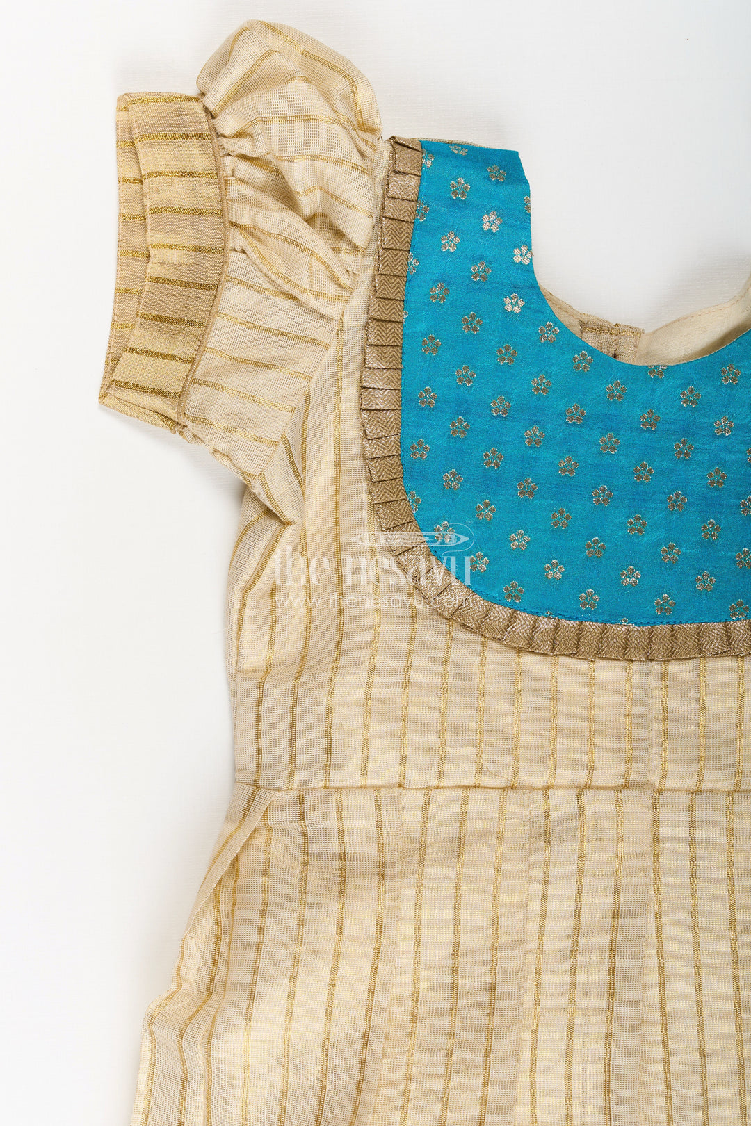 Girls Silk Frocks in Beige Tissue with Blue Semi Banaras Yoke and Traditional Pleated Design