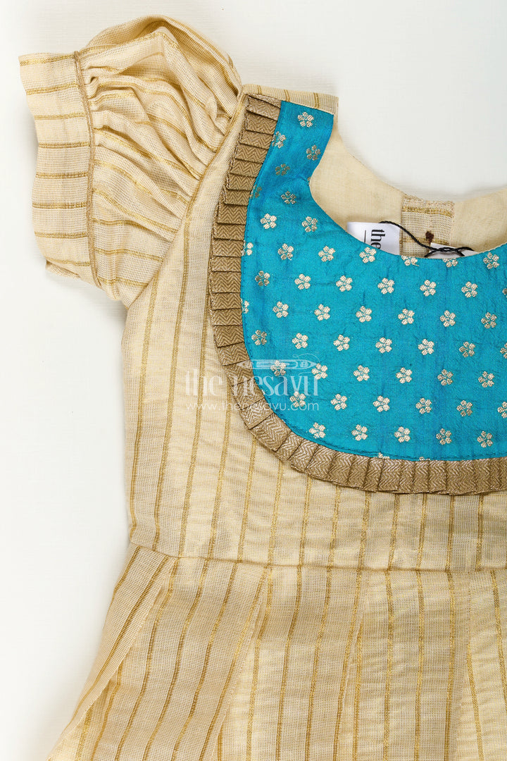 Girls Ethnic Long Frocks in Beige Silk with Blue Banaras Yoke and Structured Pleats
