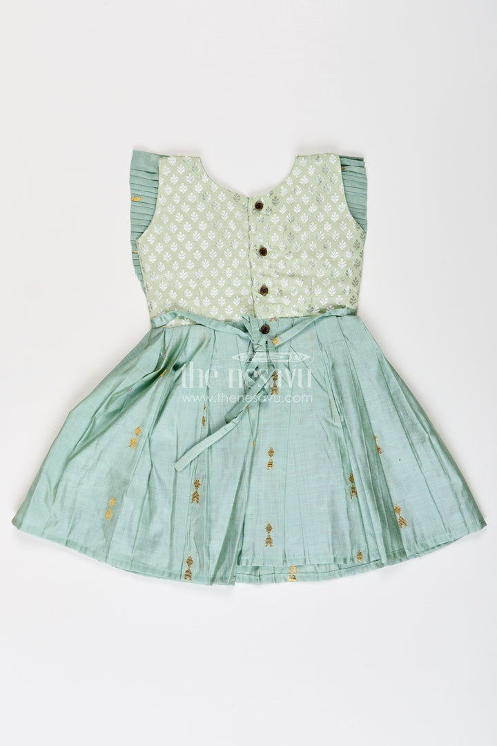 Girls Pattu Long Frocks Designs in Green Viscose with Semi Banaras Yoke and Pleated Details