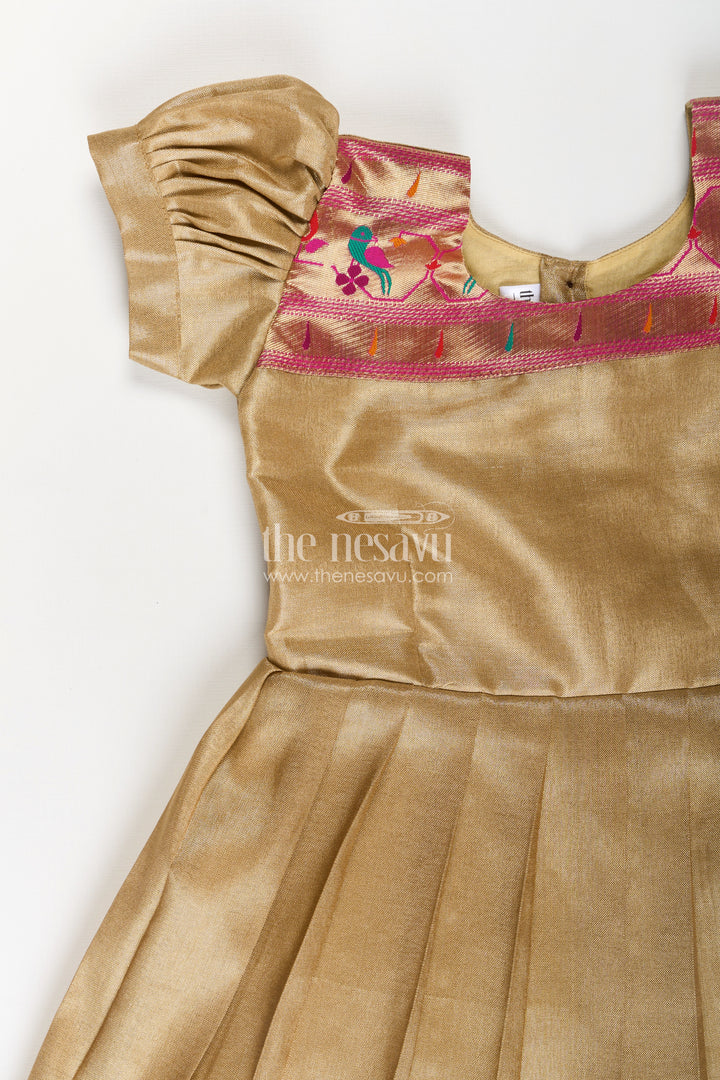 Pattu Pavadai Designs for Girls in Tissue Silk with Bright Paithani Border and Puff Sleeves
