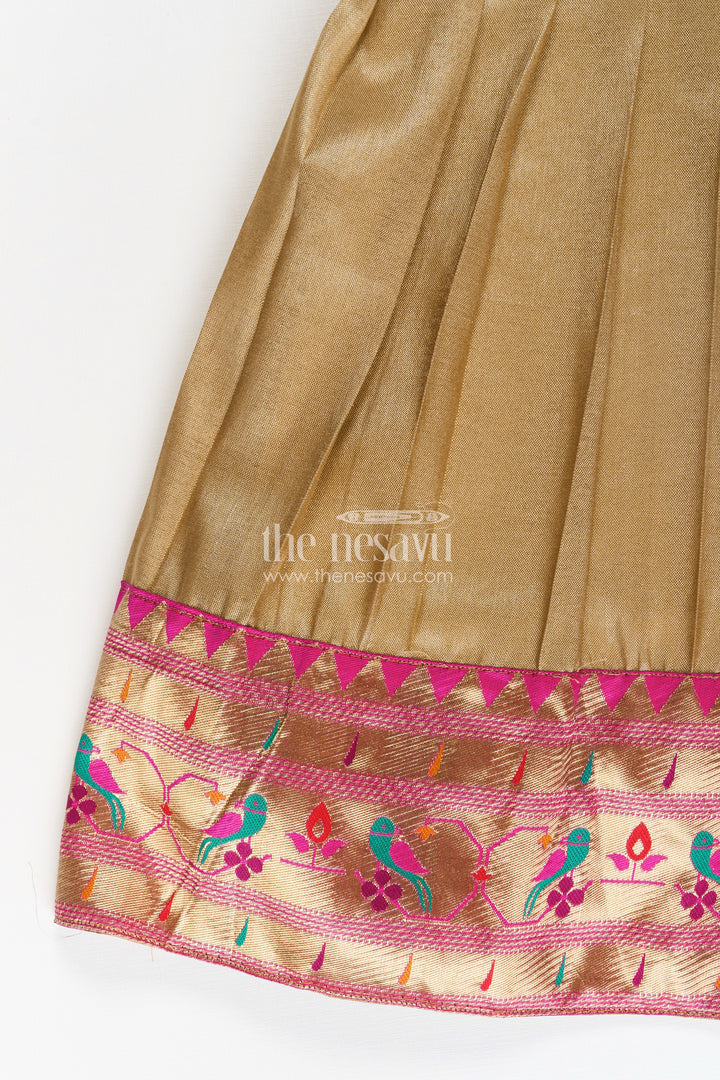Pattu Pavadai Designs for Girls in Tissue Silk with Bright Paithani Border and Puff Sleeves