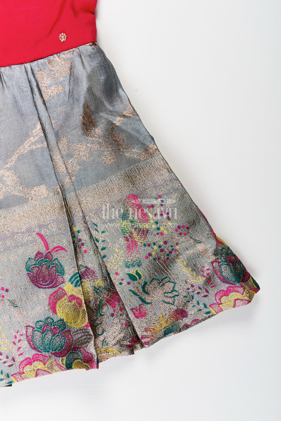 Silk party frock for baby girl with embroidered bird motif and tissue pleats