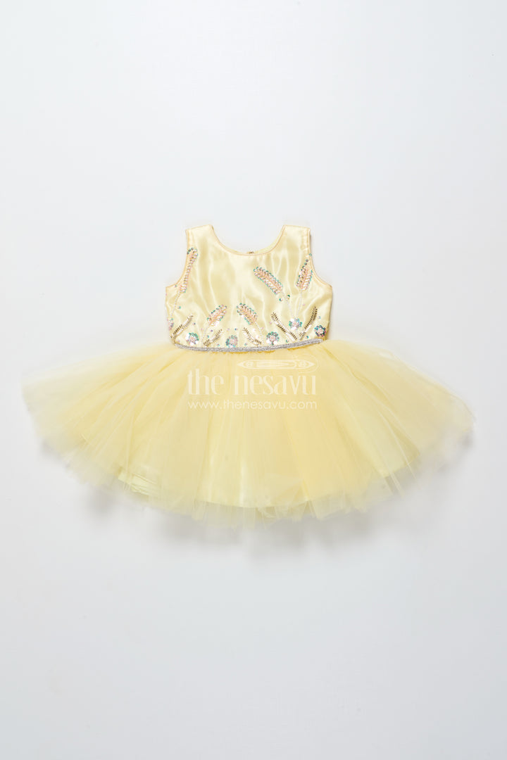 Baby girl party frock with beaded yoke and fluffy net skirt