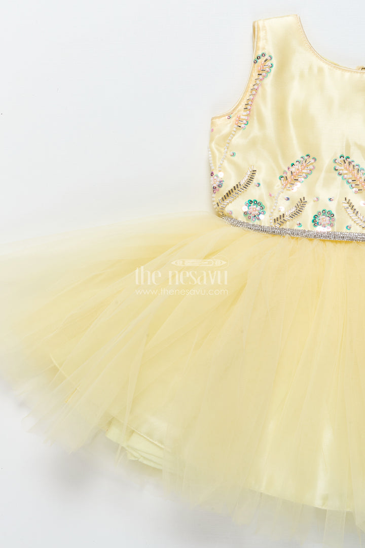 Baby girl party frock with beaded yoke and fluffy net skirt