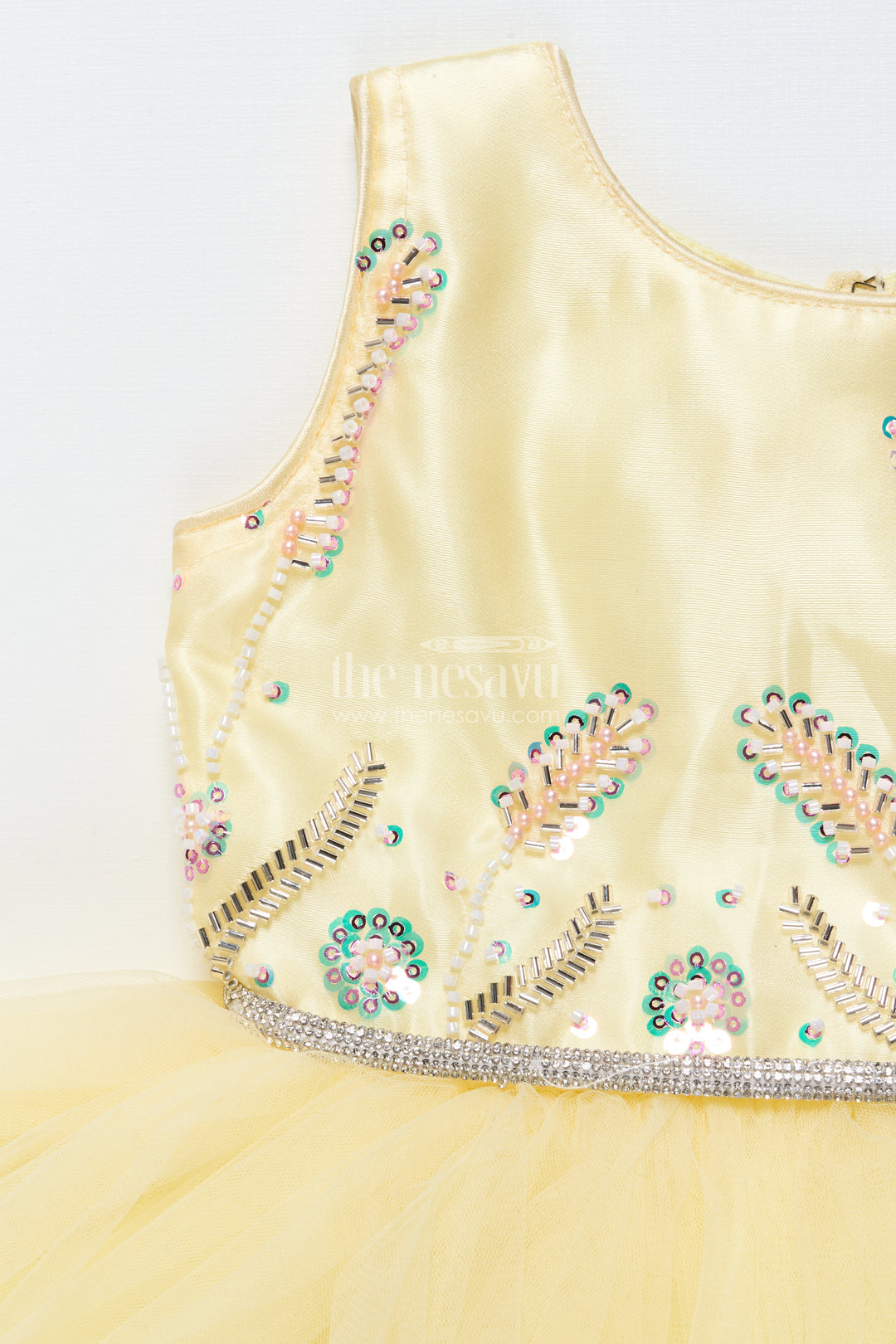 Baby girl party frock with beaded yoke and fluffy net skirt
