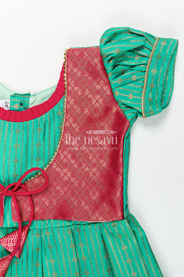 Girls Kanchivaram Silk Design Frock with Puff Sleeves Green Body and Maroon Zari Border Overlay
