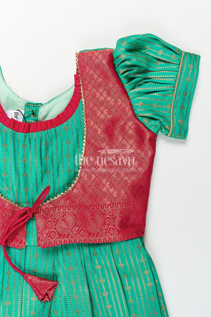 Girls Kanchivaram Silk Design Frock with Puff Sleeves Green Body and Maroon Zari Border Overlay
