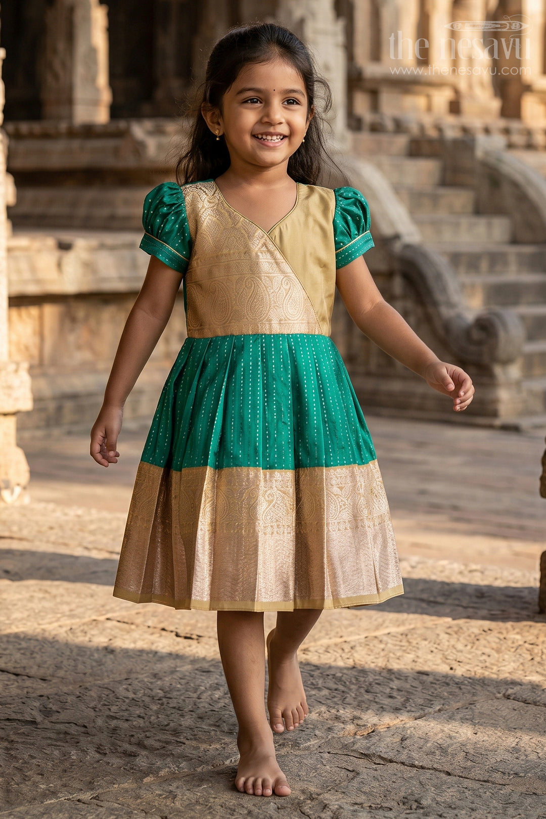 Graceful Green Silk Dress for Girls with Kanchipuram Inspired Fabric and Gold Zari Pleated Border