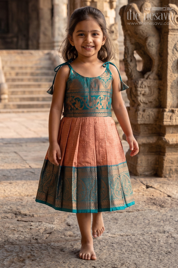 Girls Ethnic Silk Dresses in Semi Kanchivaram with Tie Up Sleeves and Zari Woven Orange Green Pleated Skirt