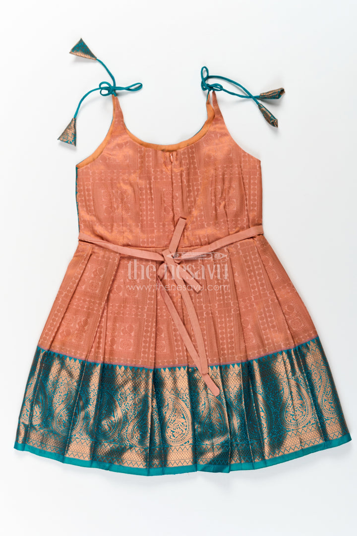 Girls Ethnic Silk Dresses in Semi Kanchivaram with Tie Up Sleeves and Zari Woven Orange Green Pleated Skirt