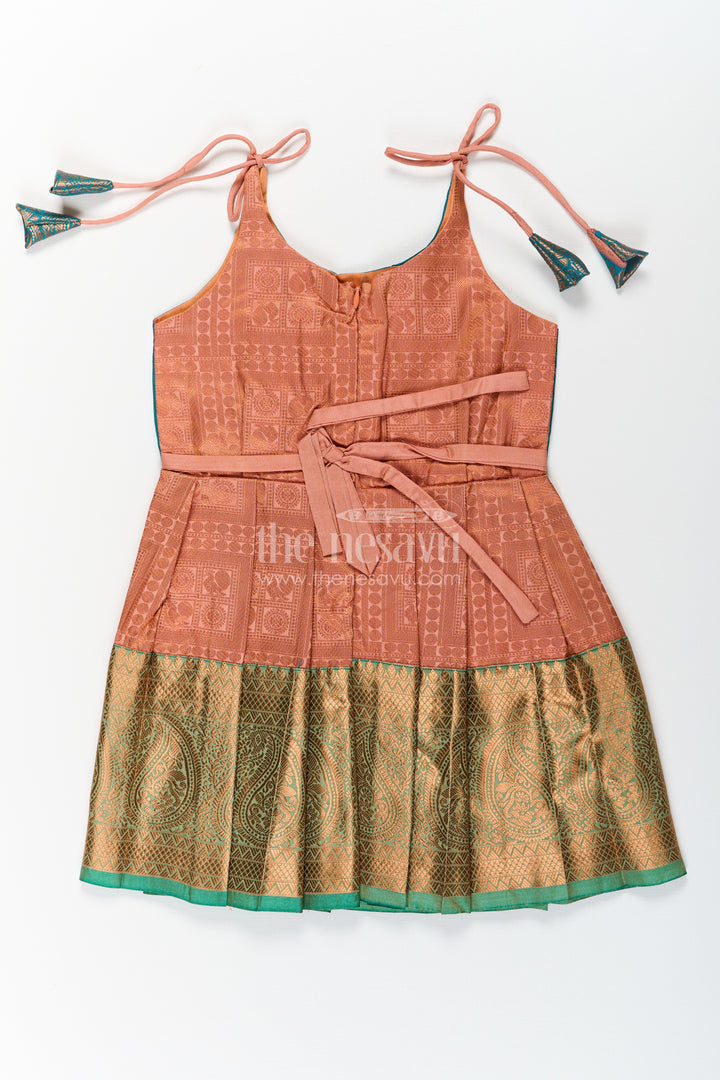 Girls Ethnic Silk Dresses in Semi Kanchivaram with Tie Up Sleeves and Zari Woven Orange Green Pleated Skirt