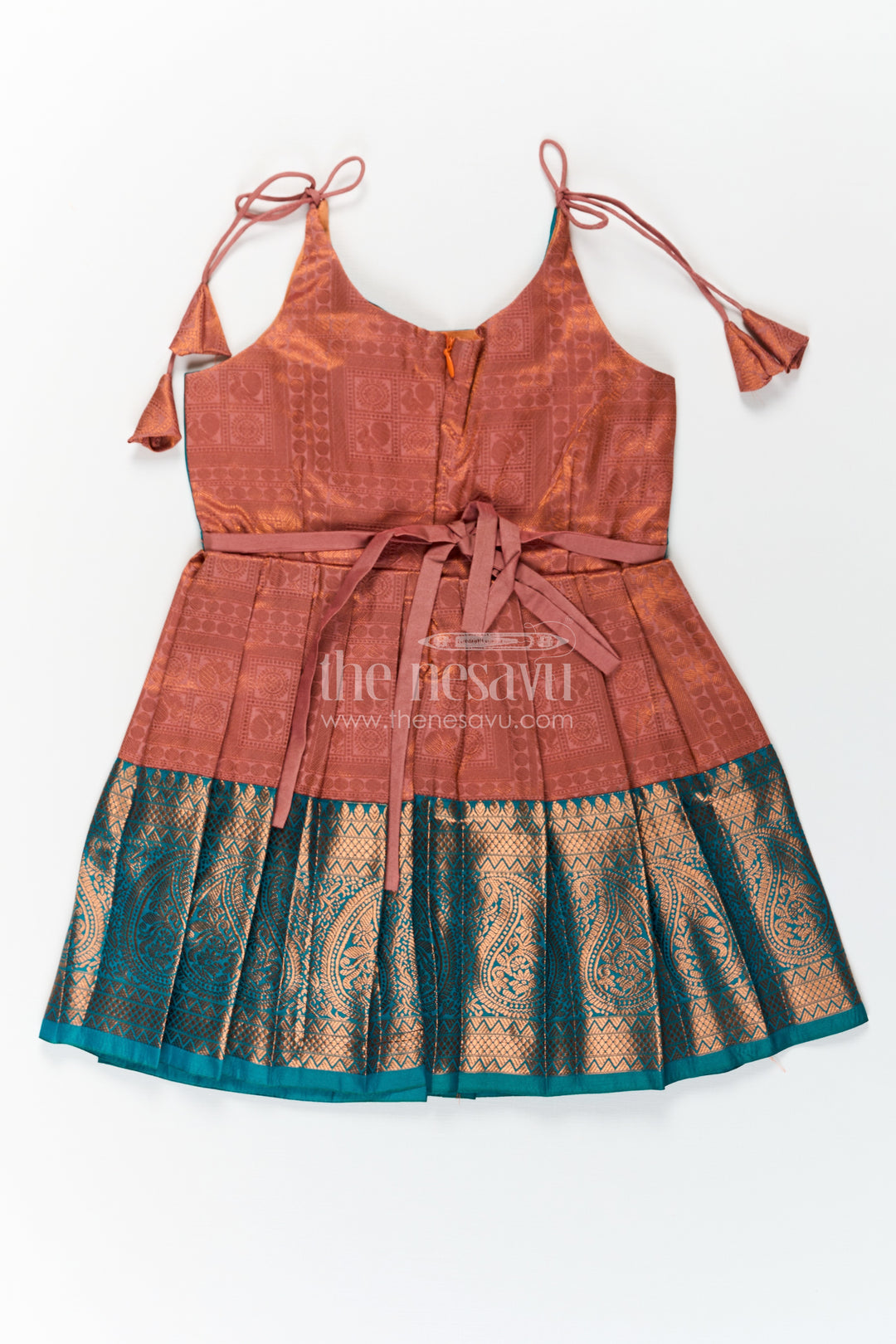 Girls Green Dress Silk Frock in Semi Kanchivaram with Tie Up Tassel Straps and Zari Pleated Hem