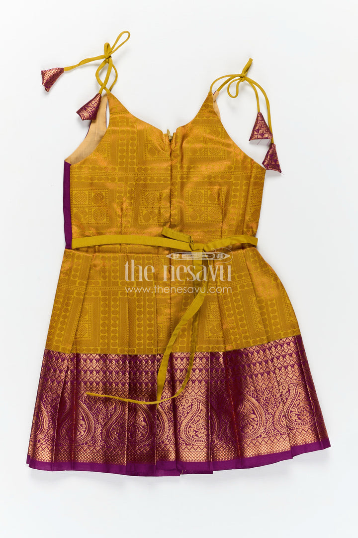 Girls Semi Kanchivaram Silk Long Frocks Designs in Maroon and Mustard with Tie-Up Tassel Straps and Pleated Skirt