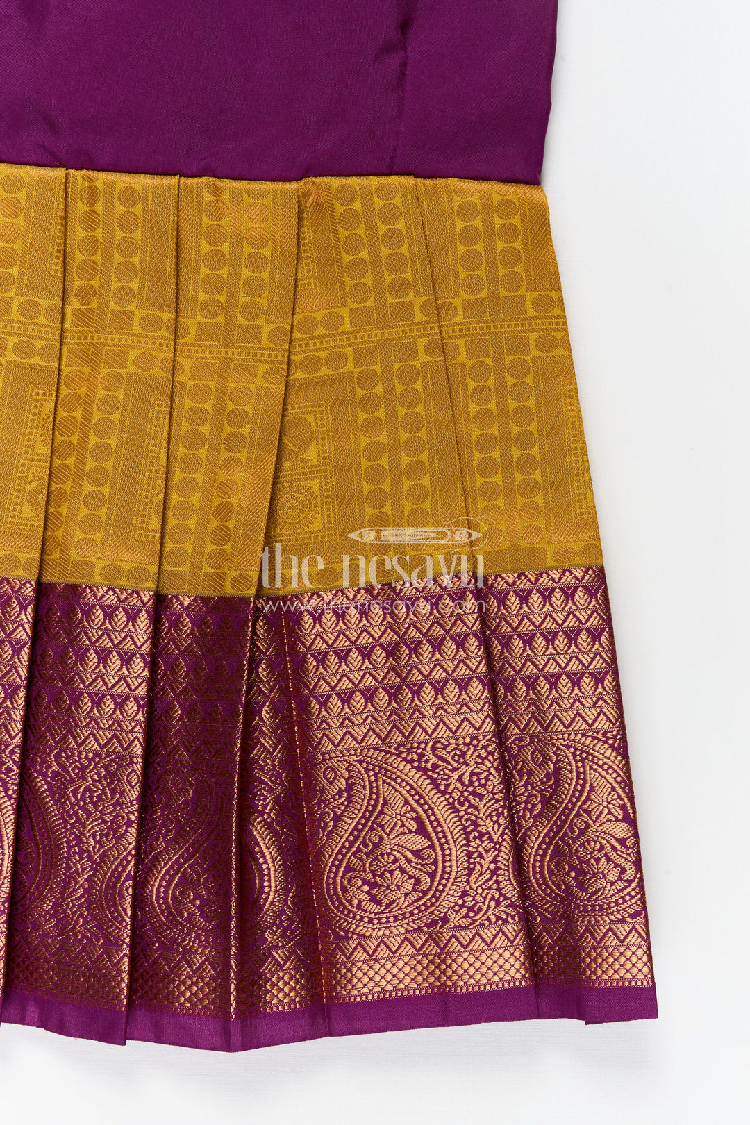 Girls Semi Kanchivaram Silk Long Frocks Designs in Maroon and Mustard with Tie-Up Tassel Straps and Pleated Skirt