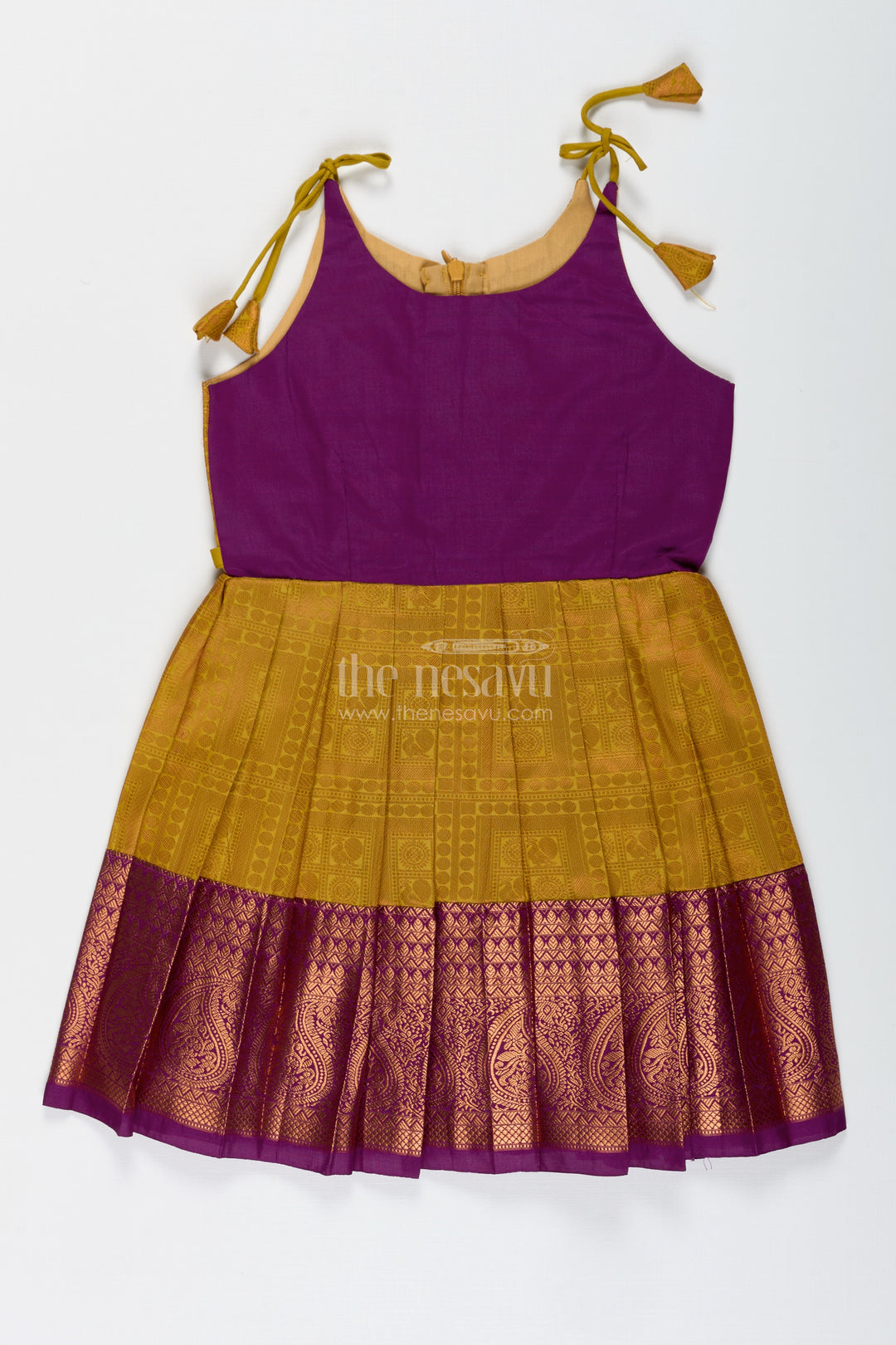 Girls Semi Kanchivaram Silk Long Frocks Designs in Maroon and Mustard with Tie-Up Tassel Straps and Pleated Skirt