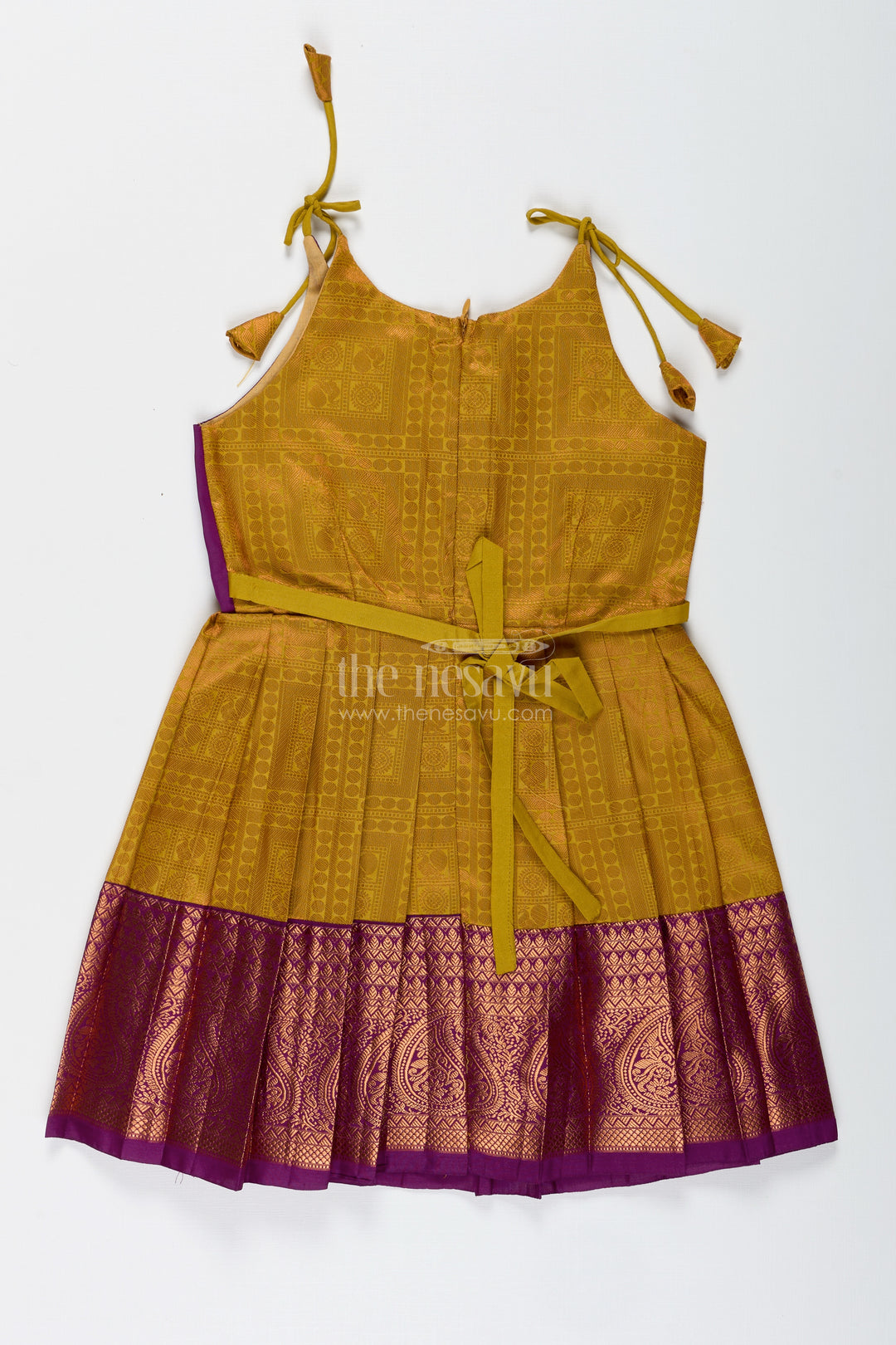 Girls Semi Kanchivaram Silk Long Frocks Designs in Maroon and Mustard with Tie-Up Tassel Straps and Pleated Skirt