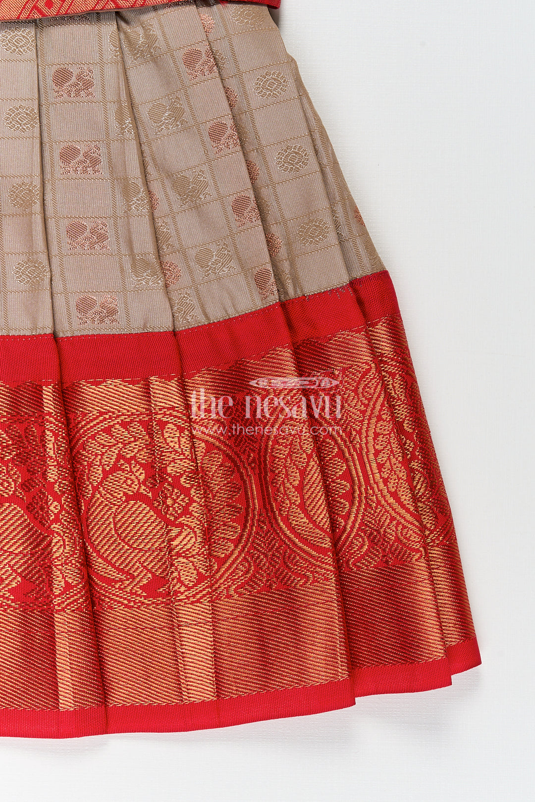 Girls Kanchivaram Soft Silk Frocks with Beige Body Red Puff Sleeves and Rich Zari Woven Hemline