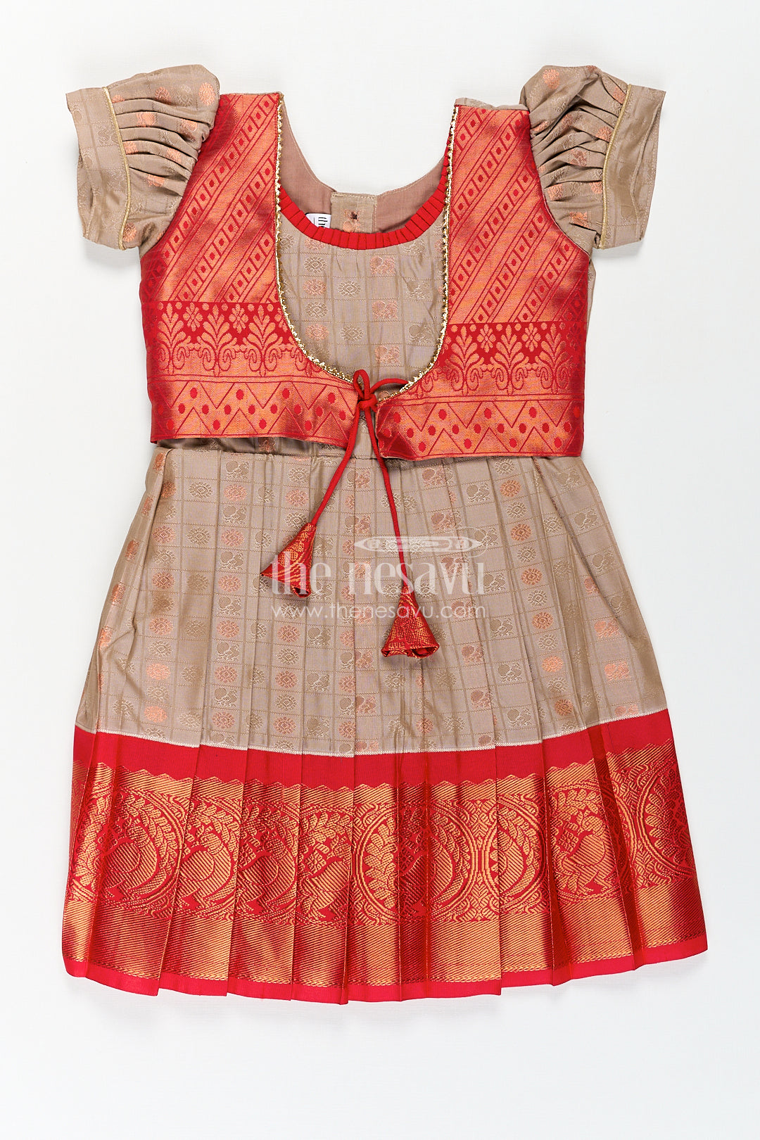 Girls Kanchivaram Soft Silk Frocks with Beige Body Red Puff Sleeves and Rich Zari Woven Hemline
