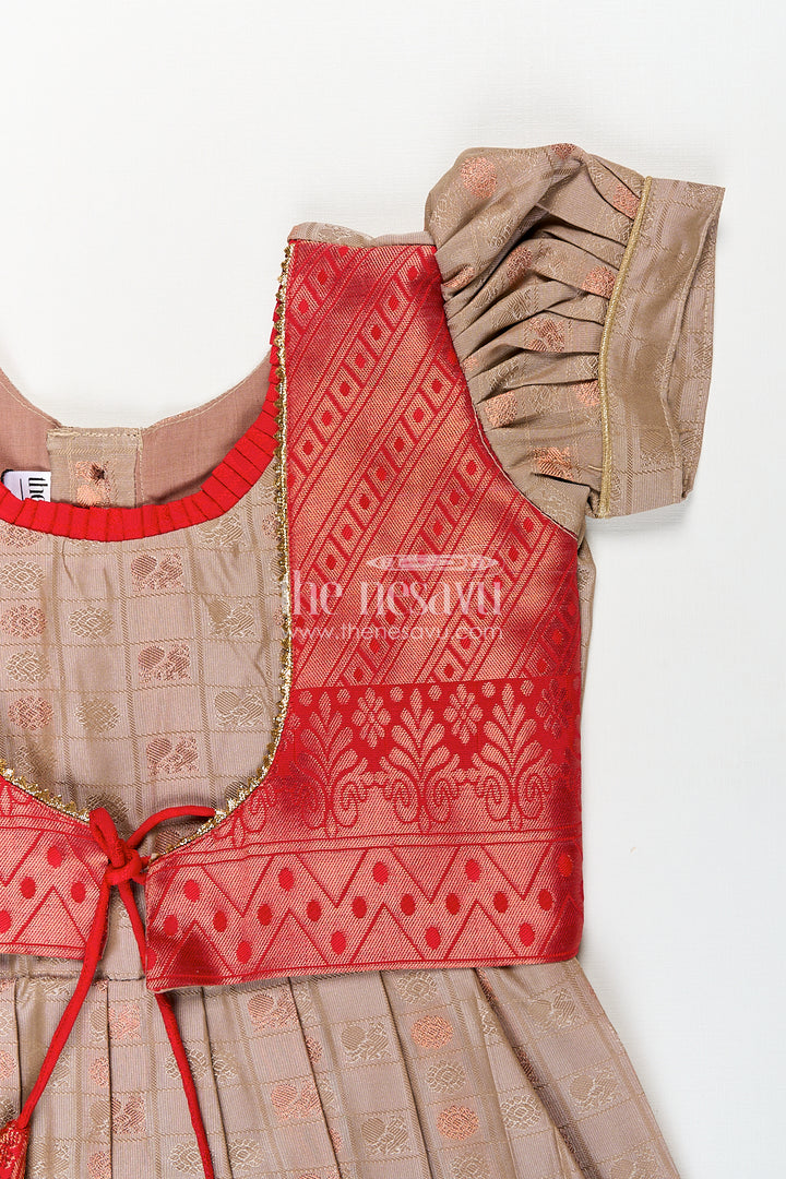 Girls Kanchivaram Soft Silk Frocks with Beige Body Red Puff Sleeves and Rich Zari Woven Hemline