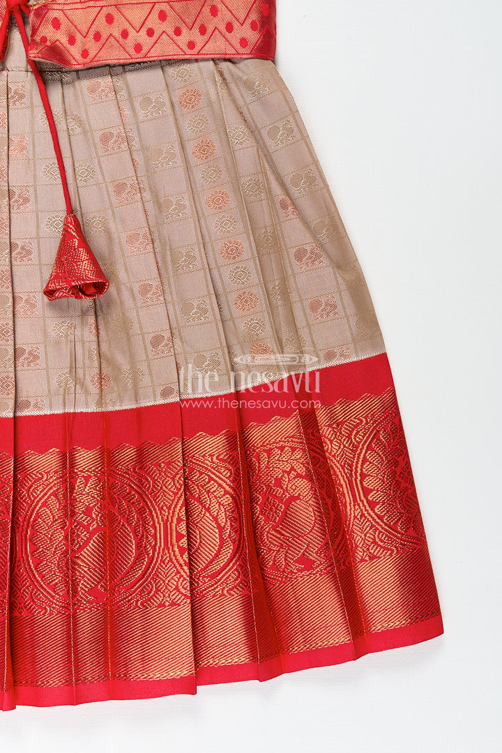 Girls Kanchivaram Soft Silk Frocks with Beige Body Red Puff Sleeves and Rich Zari Woven Hemline