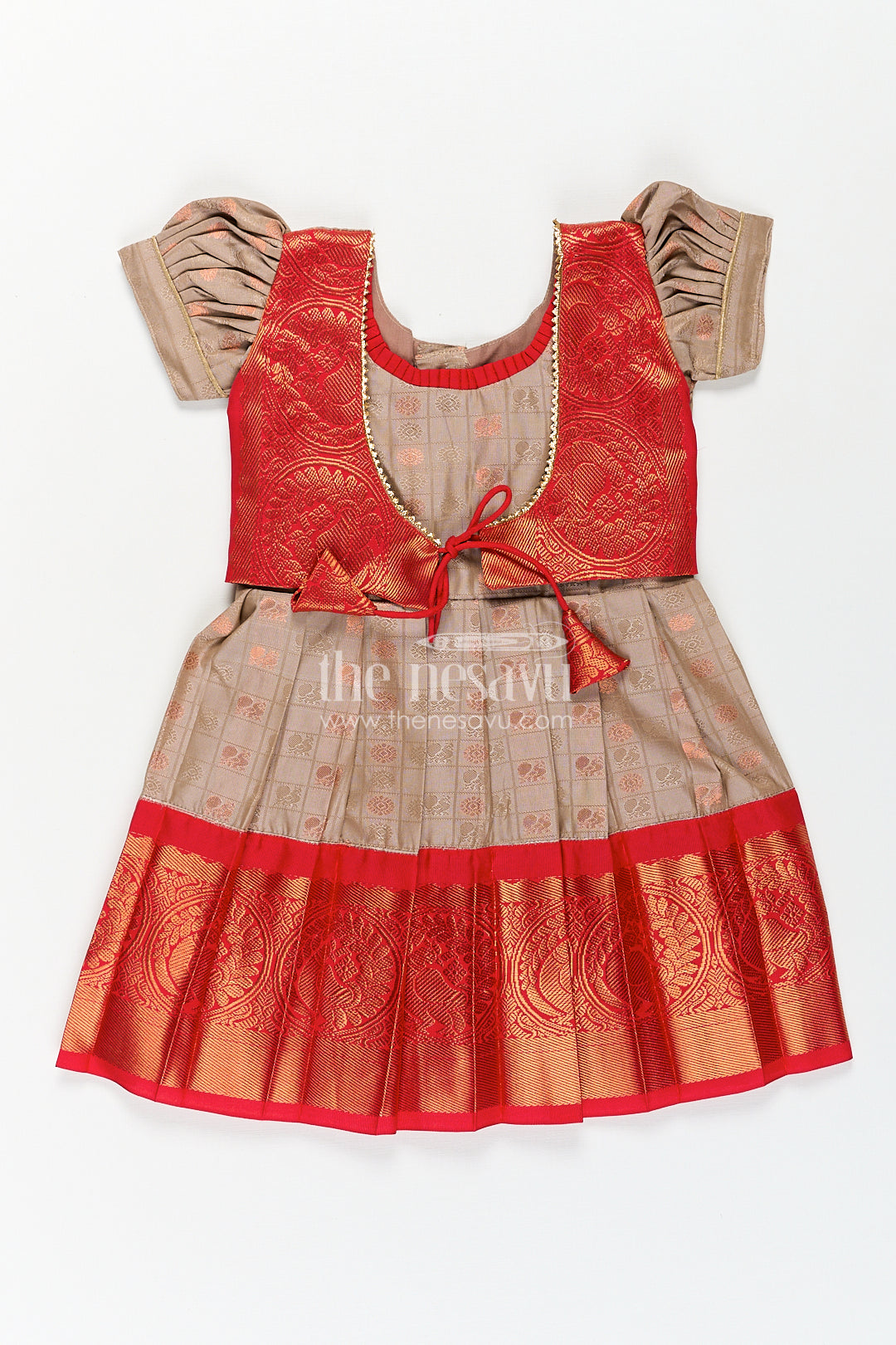 Girls Kanchivaram Soft Silk Frocks with Beige Body Red Puff Sleeves and Rich Zari Woven Hemline
