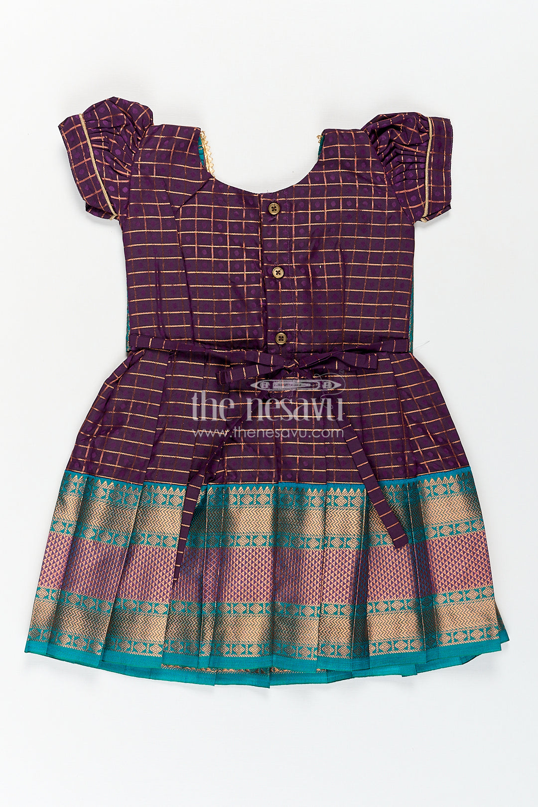 Girls Long Silk Frock Design in Semi Kanchivaram with Green Brocade Yoke and Purple Checked Pleated Skirt