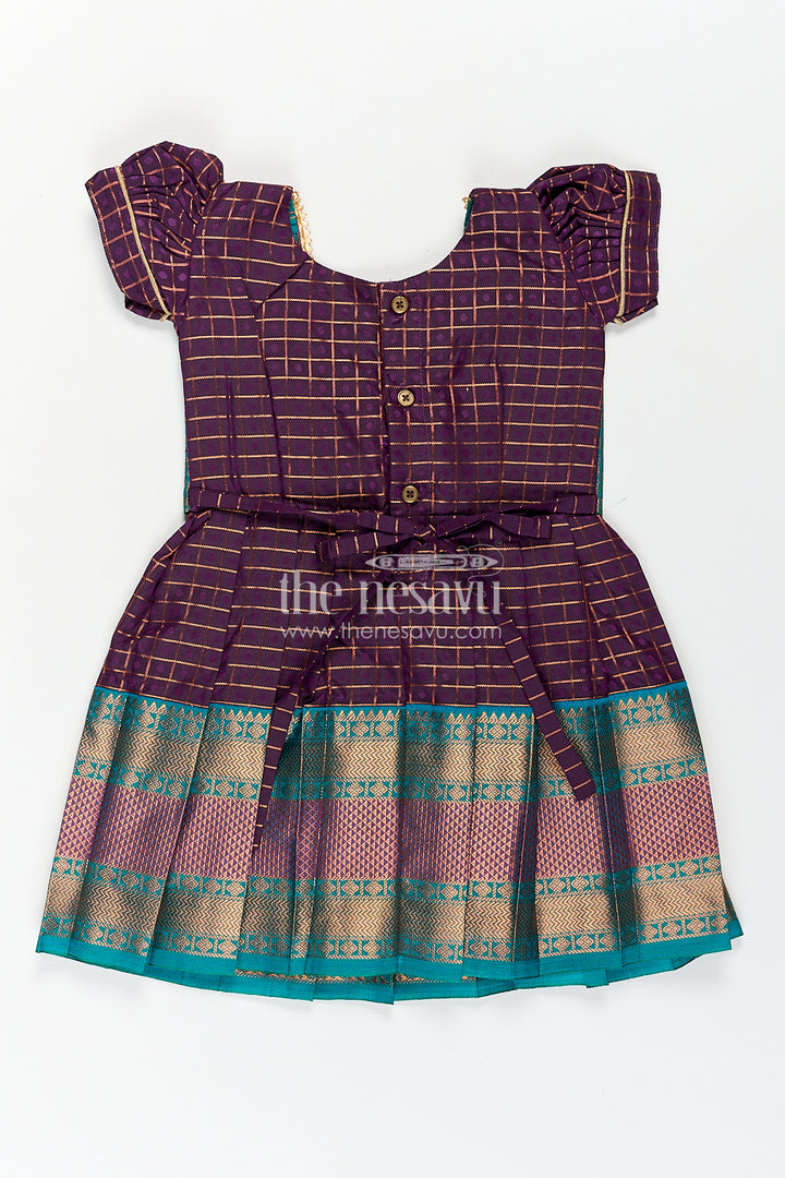 Girls Long Silk Frock Design in Semi Kanchivaram with Green Brocade Yoke and Purple Checked Pleated Skirt