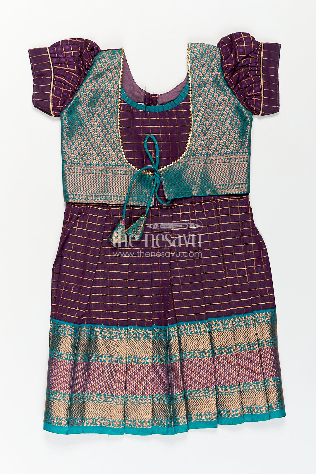 Girls Long Silk Frock Design in Semi Kanchivaram with Green Brocade Yoke and Purple Checked Pleated Skirt