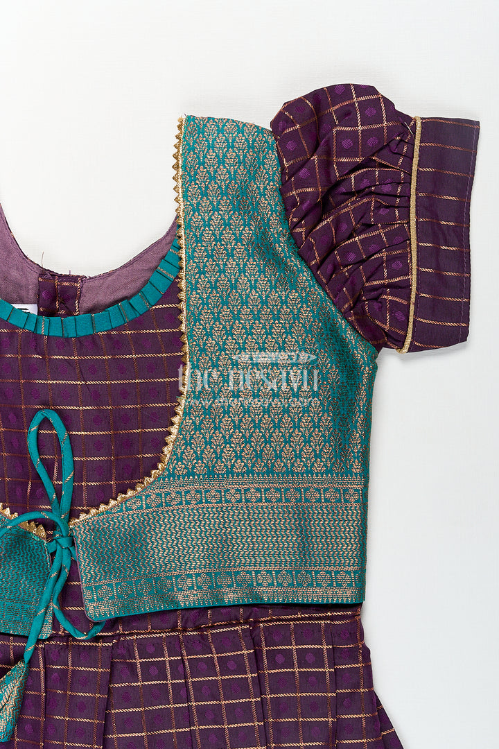 Girls Long Silk Frock Design in Semi Kanchivaram with Green Brocade Yoke and Purple Checked Pleated Skirt