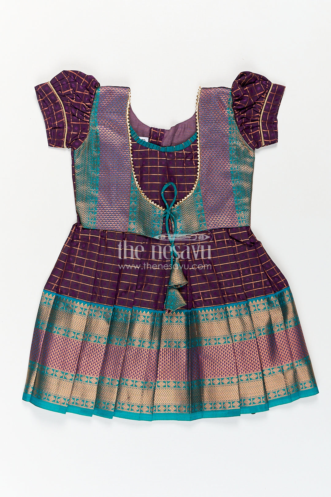 Girls Long Silk Frock Design in Semi Kanchivaram with Green Brocade Yoke and Purple Checked Pleated Skirt