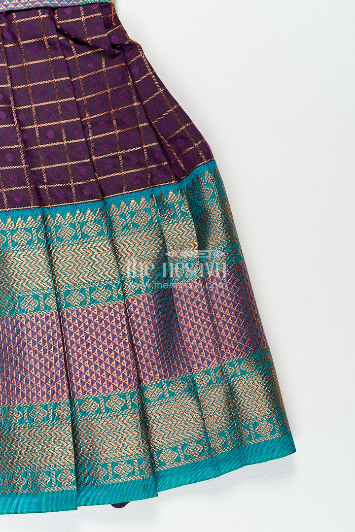 Girls Long Silk Frock Design in Semi Kanchivaram with Green Brocade Yoke and Purple Checked Pleated Skirt