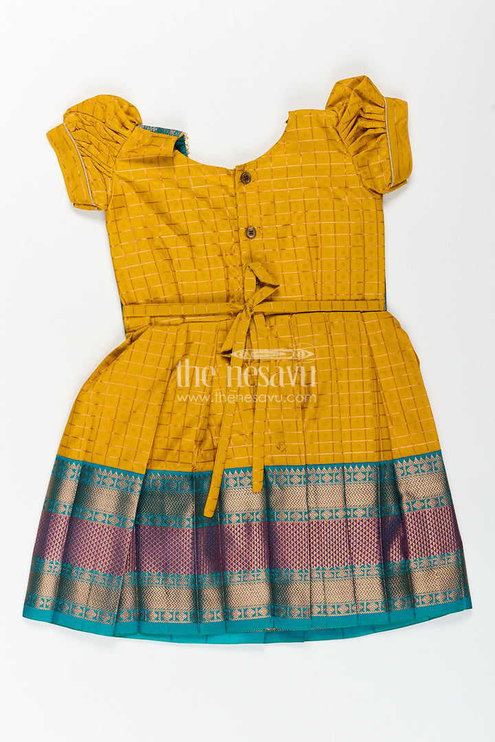 Girls Kanchivaram Ethnic Frocks in Mustard Yellow with Green Zari Overlay and Traditional Border Accents