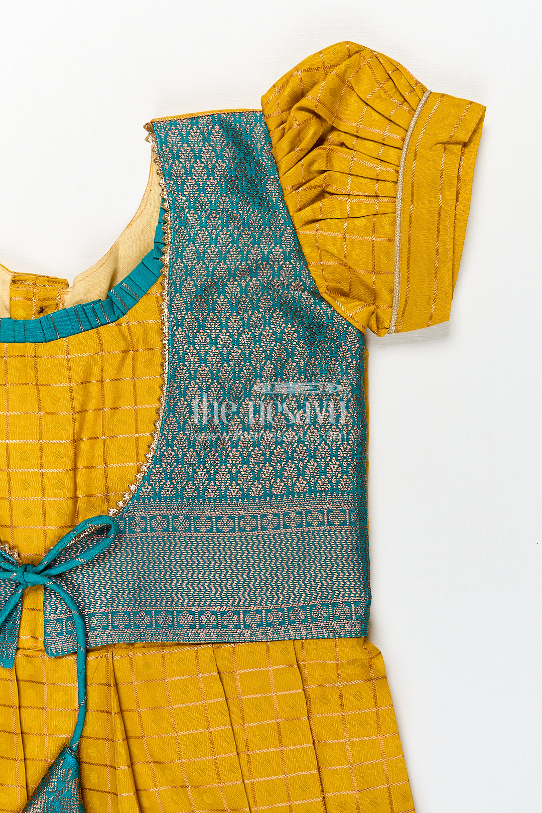 Girls Kanchivaram Ethnic Frocks in Mustard Yellow with Green Zari Overlay and Traditional Border Accents